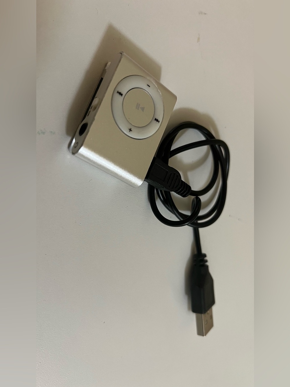 Portable Silver MP3 Player with Clip and USB Cable
